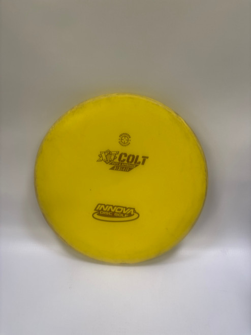 Vist Large View of Product Image Which is Used Innova XT COLT Disc Golf Putter Gold