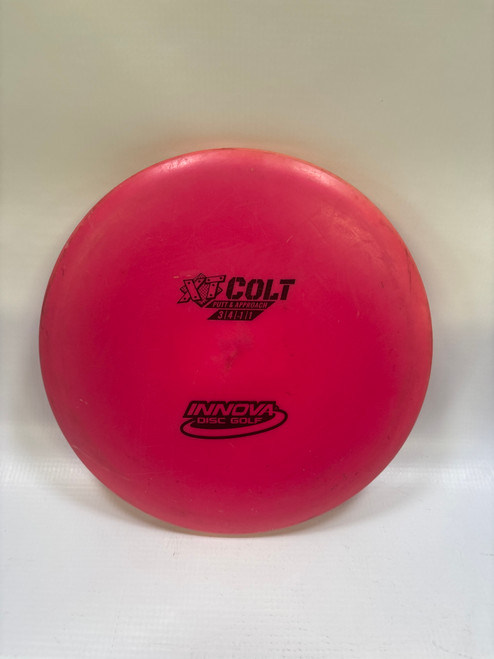 Vist Large View of Product Image Which is Used Innova XT COLT Disc Golf Putter Pink