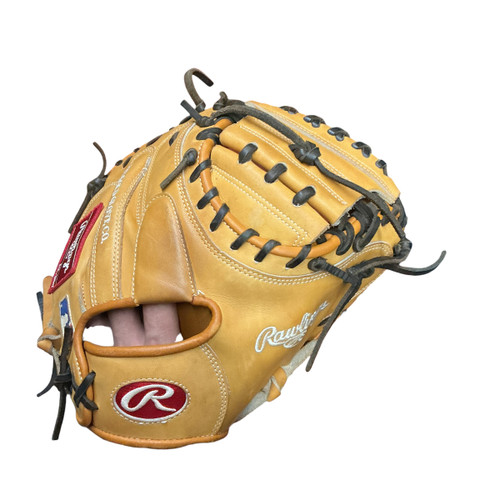 Vist Large View of Product Image Which is Used Rawlings HEART OF THE HIDE PROTCM33T Catchers RH Throw Tan 33"