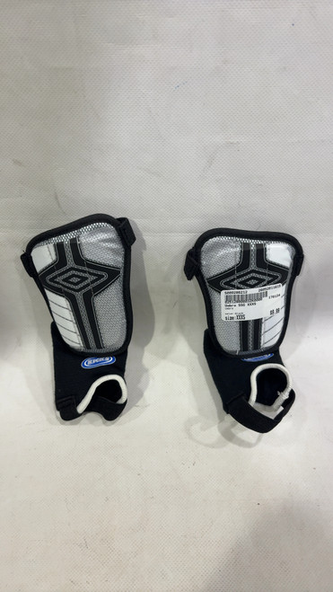 Vist Large View of Product Image Which is Used Umbro Soccer Shin Guards Youth Black XXXS
