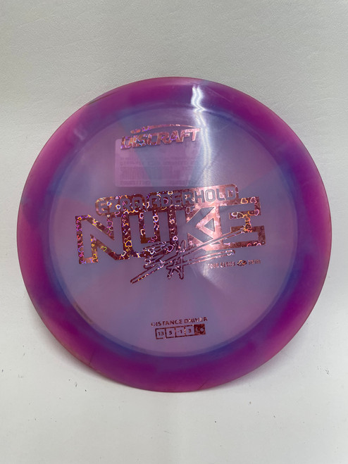 Vist Large View of Product Image Which is Used Discraft EZRA ADERHOLD NUKE Disc Golf Driver Purple