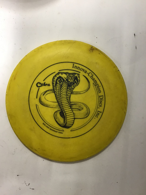Vist Large View of Product Image Which is Used Innova DX COBRA Disc Golf Mid Range Yellow 165g