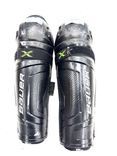 Vist Large View of Product Image Which is Used Bauer X Junior Shin Guards Black 12"