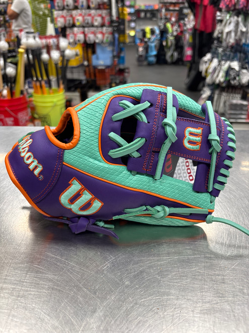 Vist Large View of Product Image Which is Brand New Wilson A1000 1786 WBW104228115 BB/SB Glove RH Throw Purple 11 1/2"