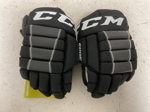 Vist Large View of Product Image Which is Used CCM EDGE Junior Gloves Black And White 11"