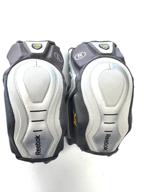 Vist Large View of Product Image Which is Used Reebok 7K Lacrosse Arm Pads/Guards Grey LG