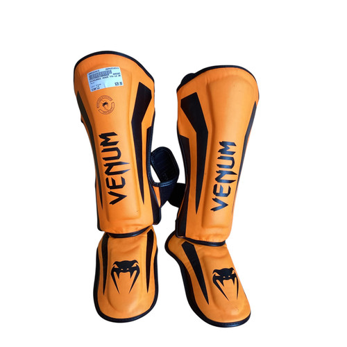 Vist Large View of Product Image Which is Used Venum Martial Arts Shin Pads Orange LG
