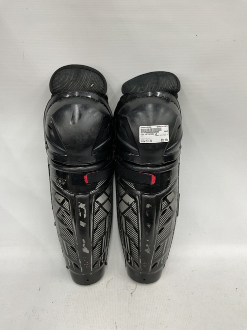 Vist Large View of Product Image Which is Used CCM JETSPEED LE Junior Shin Guards Black 13"