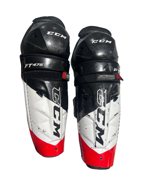 Vist Large View of Product Image Which is Used CCM FT 475 Intermediate Shin Guards Black 12"