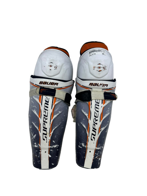 Vist Large View of Product Image Which is Used Bauer SUPREME ONE.40 Junior Shin Guards White 12"