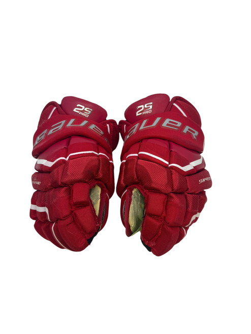 Vist Large View of Product Image Which is Used Bauer 2S PRO Junior Gloves Red 12"