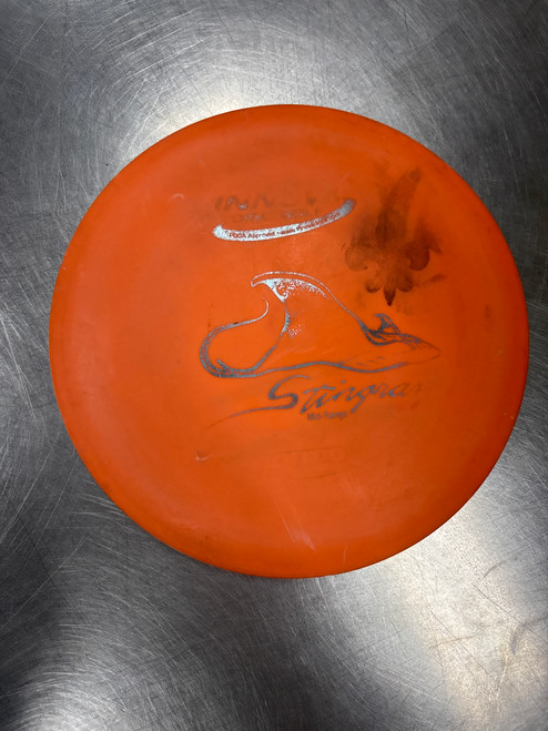 Vist Large View of Product Image Which is Used Innova DX STINGRAY Disc Golf Mid Range Orange