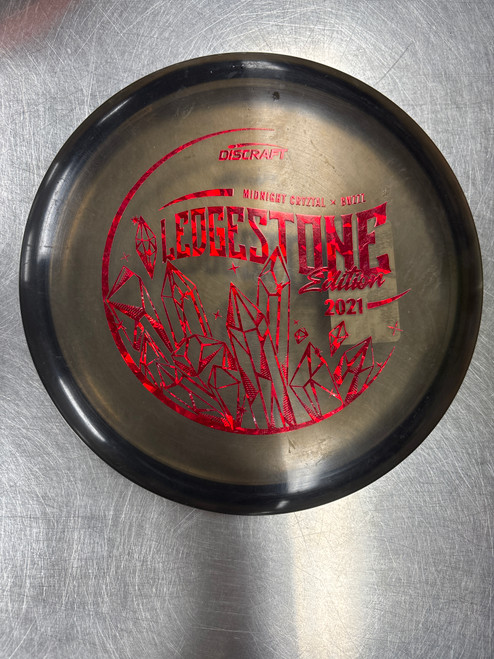 Vist Large View of Product Image Which is Used Discraft LEDGESTONE CRYZTAL BUZZZ Disc Golf Mid Range Black