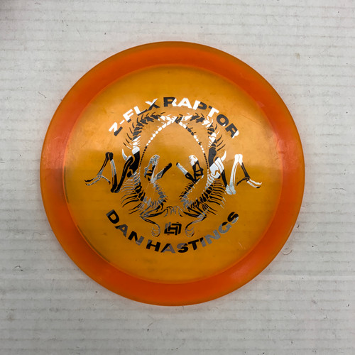 Vist Large View of Product Image Which is Used Discraft Z SWIRL RAPTOR Disc Golf Driver Orange 175g