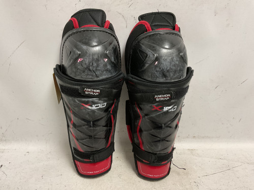 Vist Large View of Product Image Which is Used Bauer VAPOR X100 Senior Shin Guards Black And Red 14"