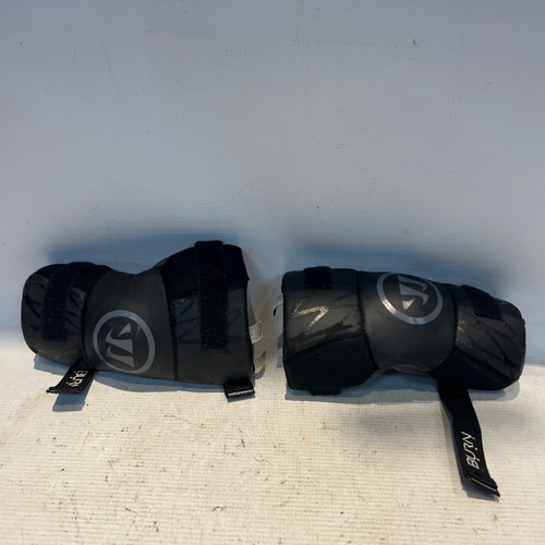Vist Large View of Product Image Which is Used Warrior BURN NEXT Lacrosse Arm Pads/Guards Black Youth