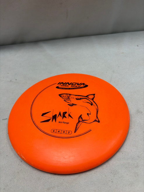 Vist Large View of Product Image Which is Used Innova SHARK Disc Golf Mid Range Orange