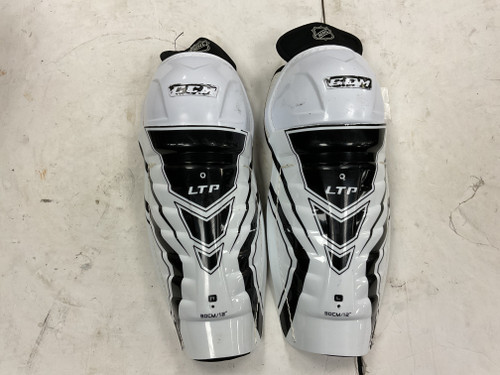 Vist Large View of Product Image Which is Used CCM LTP Junior Shin Guards White And Black 12"