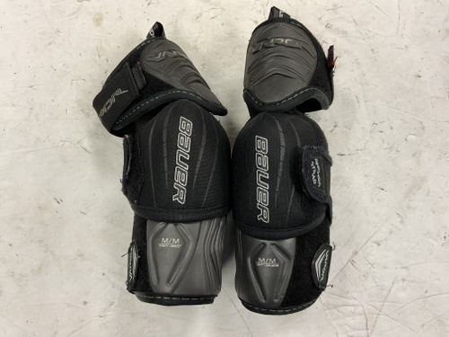 Vist Large View of Product Image Which is Used Bauer VAPOR X900 LITE Junior Elbow Pads Black And Grey MD