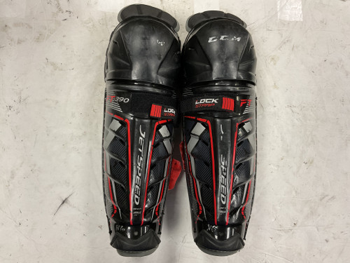 Vist Large View of Product Image Which is Used CCM JETSPEED FT390 Junior Shin Guards Black And Red 11"