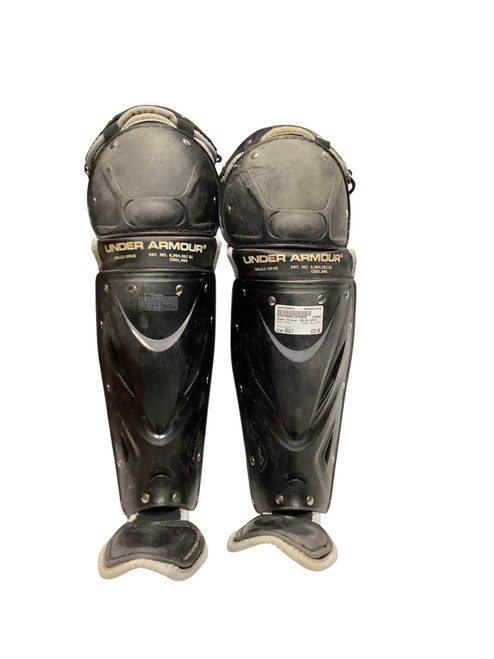 Vist Large View of Product Image Which is Used Under Armour UALG2-SRVS Catchers Leg Guards Black Adult