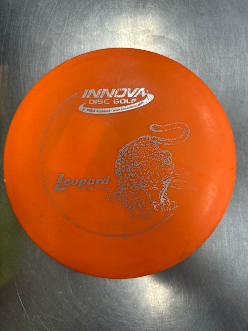 Vist Large View of Product Image Which is Used Innova DX LEOPARD Disc Golf Driver Orange
