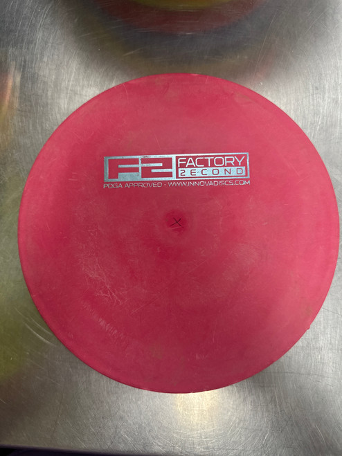 Vist Large View of Product Image Which is Used Innova DX MANTA Disc Golf Mid Range Red