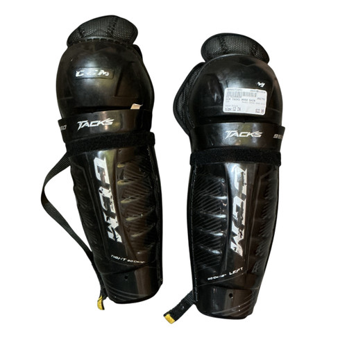 Vist Large View of Product Image Which is Used CCM TACKS 9550 SHIN Junior Shin Guards Black 12"
