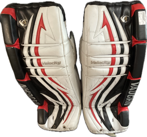 Vist Large View of Product Image Which is Used Vaughn VELOCITY V4 Goalie Leg Pads Junior White/Black/Red 31"