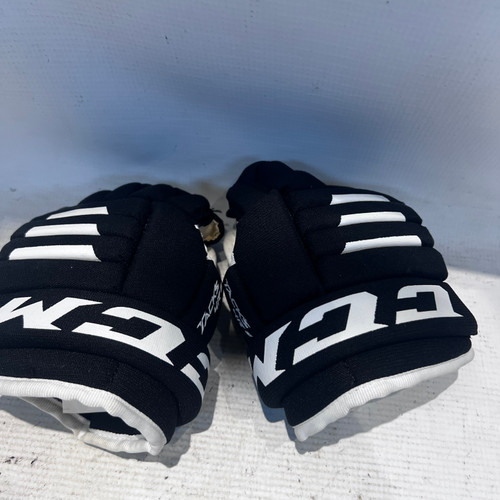 Vist Large View of Product Image Which is Used CCM TACKS 4R2 Youth Gloves Black 8"