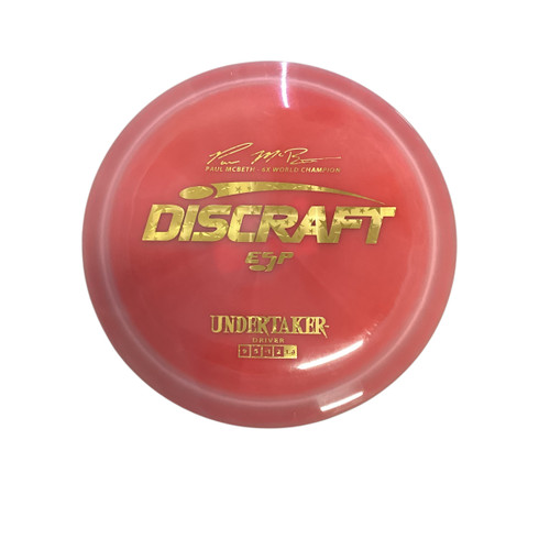 Vist Large View of Product Image Which is Used Discraft UNDERTAKER Disc Golf Driver Pink