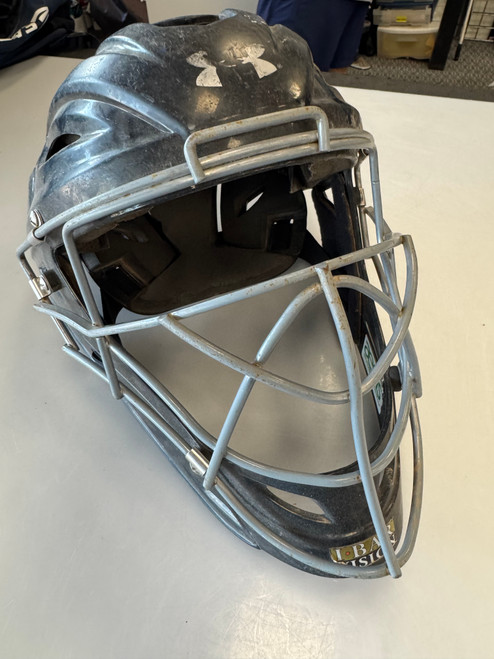 Vist Large View of Product Image Which is Used Under Armour 7-7 1/2 Catchers Helmet w/Mask Black One Size