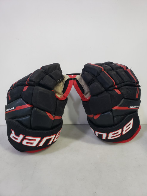 Vist Large View of Product Image Which is Used Bauer SUPREME Intermediate Gloves Black 12"