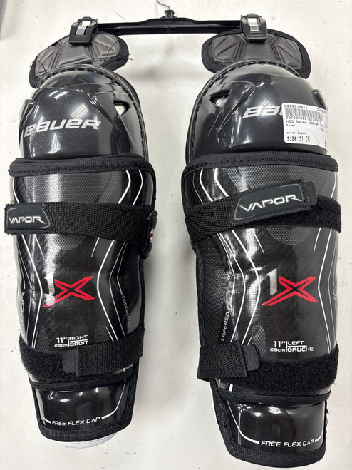 Vist Large View of Product Image Which is Used Bauer VAPOR 1X Junior Shin Guards Black 11"