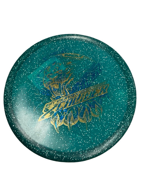 Vist Large View of Product Image Which is Used Innova MF CHAMPION GATOR MISPRINT KM XCAL Disc Golf Mid Range Teal 174g