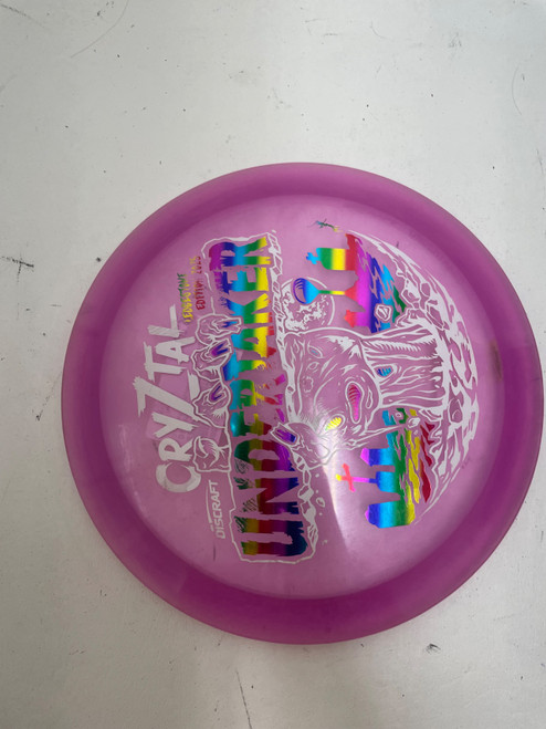 Vist Large View of Product Image Which is Used Discraft CRYZTAL UNDERTAKER Disc Golf Driver Purple