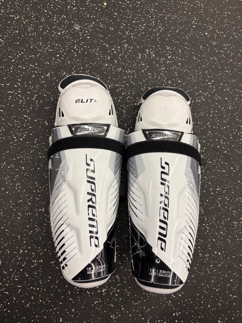 Vist Large View of Product Image Which is Used Bauer SUPREME ELITE Senior Shin Guards White 13"