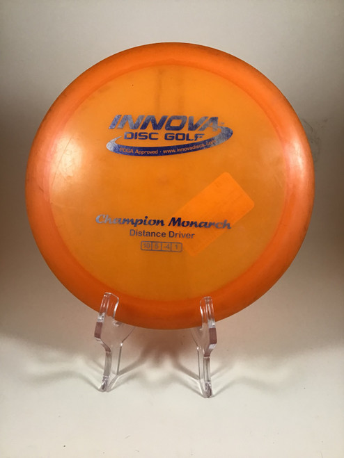 Vist Large View of Product Image Which is Used Innova CHAMPION MONARCH Disc Golf Driver Orange 166g