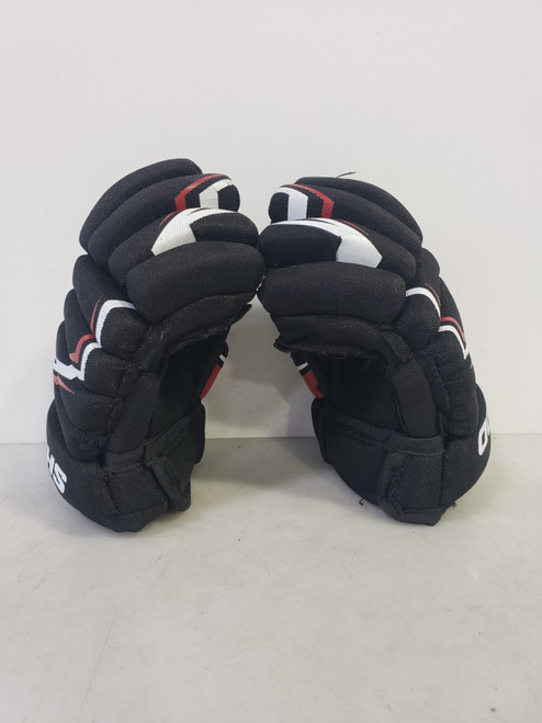 Vist Large View of Product Image Which is Used CCM ULTRA 2.0 Youth Gloves Black 9"