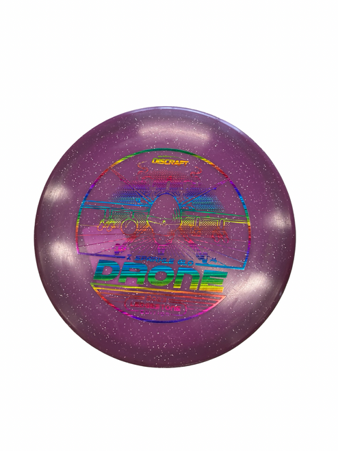Vist Large View of Product Image Which is Used Discraft DRONE Disc Golf Mid Range Purple