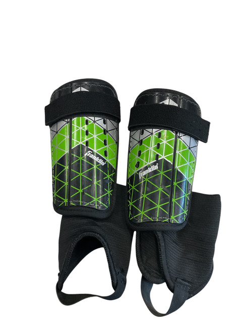 Vist Large View of Product Image Which is Used Franklin Soccer Shin Guards Junior Black And Green Junior