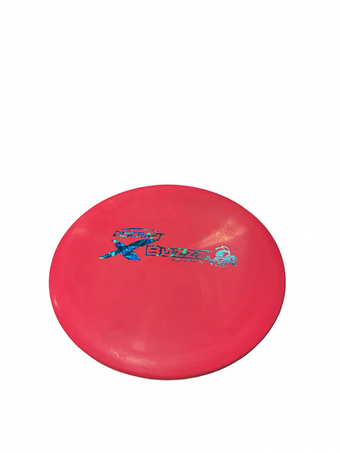 Vist Large View of Product Image Which is Used Discraft X BUZZZ Disc Golf Mid Range Neon Orange