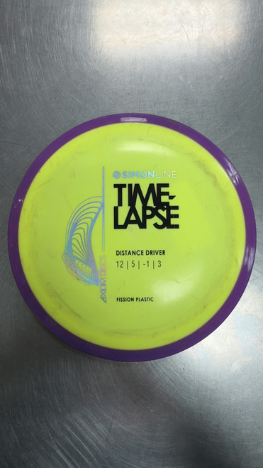 Vist Large View of Product Image Which is Used Axiom TIME LAPSE Disc Golf Driver Yellow