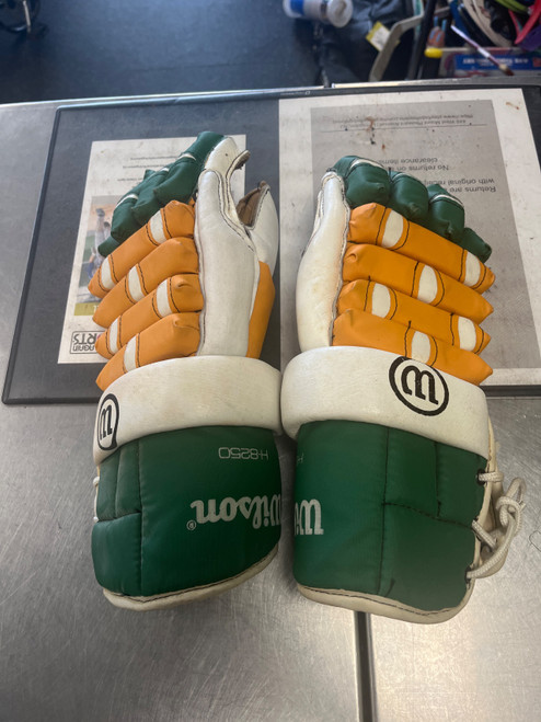 Vist Large View of Product Image Which is Used WILSON H-8250 Senior Gloves Green And Gold 14"