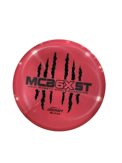 Vist Large View of Product Image Which is Used Discraft PAUL MCBETH MCB 6X ST Other Golf Disc Red