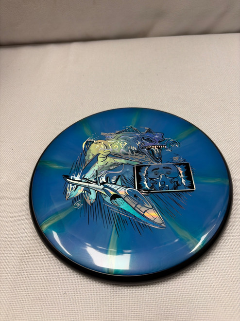 Vist Large View of Product Image Which is Used MVP COSMIC NEUTRON NOMAD Disc Golf Putter Royal Blue