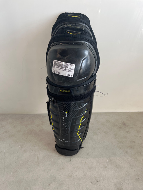 Vist Large View of Product Image Which is Used CCM TACKS 6052 SHIN PAD Junior Shin Guards Black 12"