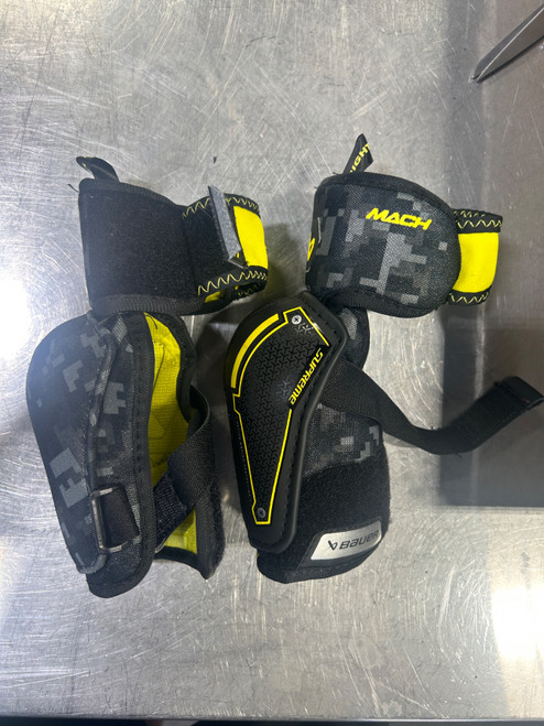 Vist Large View of Product Image Which is Used Bauer MACH Youth Elbow Pads Black LG