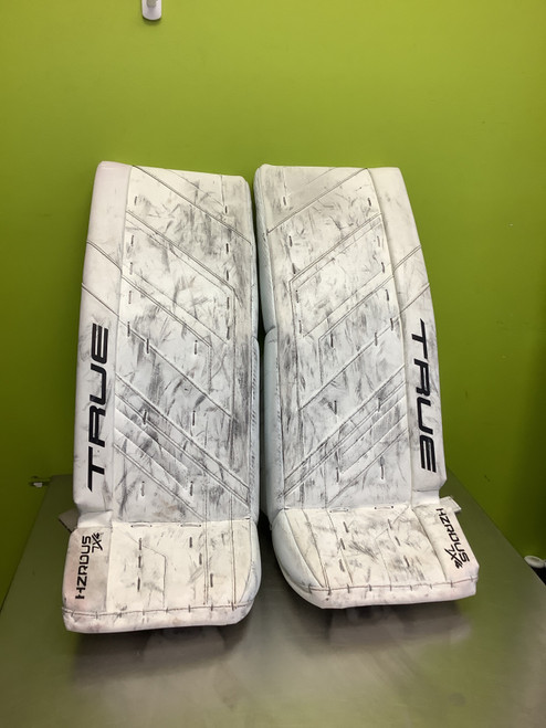 Vist Large View of Product Image Which is Used True HZRDUS 7X4 Goalie Leg Pads Inter White 30"