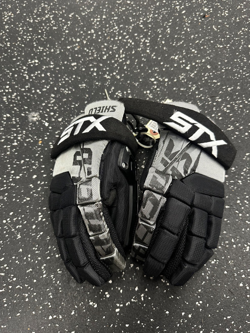 Vist Large View of Product Image Which is Used STX SHIELD LAX Goalie Gloves Y Black 10"
